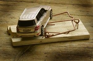 car caught in a mouse trap | Colorado Springs bad faith insurance attorneys